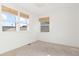 Bright bedroom with large windows and neutral wall at 3428 S Sherman St, Englewood, CO 80113