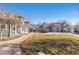 Pathway leads to gray houses in a community at 3428 S Sherman St, Englewood, CO 80113