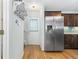 Entryway with wood floors, white door, and stairs at 3428 S Sherman St, Englewood, CO 80113