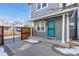 Townhouse exterior with teal door and gate at 3428 S Sherman St, Englewood, CO 80113