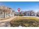 Front view of a townhome with landscaping and walkway at 3428 S Sherman St, Englewood, CO 80113