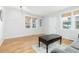 Living room with hardwood floors and gray couch at 3428 S Sherman St, Englewood, CO 80113