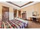 Bedroom featuring wood trim, multiple points of entry and exterior views from every angle at 30 W Ranch Trl, Morrison, CO 80465