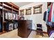 Walk in closet has plenty of storage with custom drawers and shelves and natural light at 30 W Ranch Trl, Morrison, CO 80465