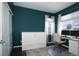 Versatile bedroom with a Murphy bed and a dedicated workspace at 542 W 173Rd Ave, Broomfield, CO 80023