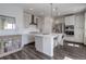 Bright, modern kitchen featuring stainless steel appliances and a center island with seating at 542 W 173Rd Ave, Broomfield, CO 80023