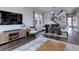 Cozy living room that offers great natural light and has stairs leading to the upper level at 542 W 173Rd Ave, Broomfield, CO 80023