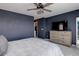 Main bedroom with a ceiling fan and TV at 542 W 173Rd Ave, Broomfield, CO 80023