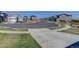 A quiet street featuring sidewalks lined with well-maintained homes and manicured lawns at 542 W 173Rd Ave, Broomfield, CO 80023
