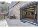 Back patio entrance featuring a covered outdoor seating area, and open access to the indoor living space at 2971 Fall River Rd, Idaho Springs, CO 80452