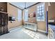 Bonus room with natural light, carpet flooring and a vintage work station at 2971 Fall River Rd, Idaho Springs, CO 80452
