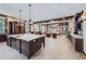 Spacious open-concept kitchen and living area, featuring a large island and modern design at 2971 Fall River Rd, Idaho Springs, CO 80452