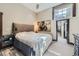 Comfortable primary bedroom featuring a walk-in and private ensuite bathroom at 2971 Fall River Rd, Idaho Springs, CO 80452