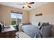 Bedroom with daybed, desk and window at 5351 Royal Pine St, Brighton, CO 80601