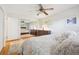 Spacious bedroom with hardwood floors, a mirror closet and light, neutral decor at 1040 Zang St, Golden, CO 80401