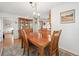 Formal dining room featuring hardwood floors and a classic chandelier at 1040 Zang St, Golden, CO 80401
