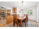 Cozy dining area next to the kitchen, perfect for Gathering dinners and entertaining at 1040 Zang St, Golden, CO 80401