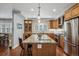 Beautiful kitchen featuring hardwood floors, granite counters, stainless appliances, and custom cabinets at 583 S York St, Denver, CO 80209