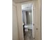 Cozy bathroom featuring tiled shower, tiled floors, and modern toilet at 384 S Ironton St # 407, Aurora, CO 80012