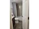 Cozy bathroom featuring tiled shower, tiled floors, and modern toilet at 384 S Ironton St # 407, Aurora, CO 80012