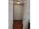 Hallway with wood floors, white walls and white trim at 384 S Ironton St # 407, Aurora, CO 80012