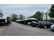 Outdoor parking lot with covered spots for residents of the apartment complex at 384 S Ironton St # 407, Aurora, CO 80012
