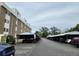 Row of covered parking spots available to residents of the apartment building at 384 S Ironton St # 407, Aurora, CO 80012