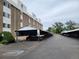Outdoor parking lot with multiple covered spaces available for residents of the complex at 384 S Ironton St # 407, Aurora, CO 80012