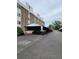Covered parking spot at this complex with the building in the background at 384 S Ironton St # 407, Aurora, CO 80012