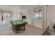 Finished basement with a pool table and ample space for recreation and entertainment at 862 W 129Th Pl, Westminster, CO 80234