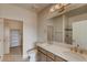 Elegant bathroom features double sinks, large mirror, and modern fixtures at 862 W 129Th Pl, Westminster, CO 80234