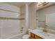 Bathroom with a modern vanity and a tiled shower-tub combo at 862 W 129Th Pl, Westminster, CO 80234