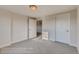 Spacious bedroom with neutral walls, carpet flooring, and two doors at 862 W 129Th Pl, Westminster, CO 80234
