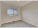 Well-lit bedroom with a large window offering neighborhood views at 862 W 129Th Pl, Westminster, CO 80234