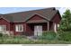 Stylish home featuring stone and siding, complemented by manicured landscaping and a welcoming front porch at 862 W 129Th Pl, Westminster, CO 80234