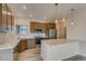 Stylish kitchen with stainless steel appliances and breakfast bar at 862 W 129Th Pl, Westminster, CO 80234