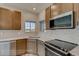 Kitchen featuring stainless appliances and natural light at 862 W 129Th Pl, Westminster, CO 80234