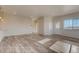 Bright living room features hardwood floors and natural light from large windows at 862 W 129Th Pl, Westminster, CO 80234