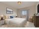 Serene main bedroom with a comfortable bed, soft lighting, and a peaceful atmosphere at 862 W 129Th Pl, Westminster, CO 80234