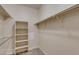 Bright walk-in closet with built-in shelving and ample hanging space at 862 W 129Th Pl, Westminster, CO 80234