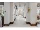 Elegant hallway boasts sophisticated lighting, neutral color palette, and seamless flow to other living spaces at 1820 Mallard Dr, Broomfield, CO 80020