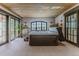Relaxing hot tub room featuring a wood ceiling, tile floors and natural light at 1820 Mallard Dr, Broomfield, CO 80020