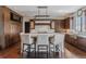 Gourmet kitchen with a large island, custom cabinetry, and high-end stainless steel appliances at 1820 Mallard Dr, Broomfield, CO 80020