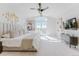 Spacious main bedroom with balcony, high ceilings, refined decor, and ample natural light at 1820 Mallard Dr, Broomfield, CO 80020