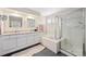 Bathroom with large soaking tub and separate shower and double vanity at 7638 S Hudson Way, Centennial, CO 80122