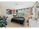 Bedroom with dark bedding, desk, white dresser, and window with blinds at 7638 S Hudson Way, Centennial, CO 80122