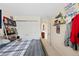 Bedroom with view to closet, and decor on wall at 7638 S Hudson Way, Centennial, CO 80122