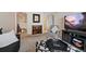 Living room with neutral decor, and view to stairs to the upper level at 7638 S Hudson Way, Centennial, CO 80122