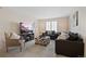 Comfortable living room with neutral carpet and furniture, and natural light at 7638 S Hudson Way, Centennial, CO 80122