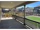 View of neighboring homes and manicured lawns from the covered patio at 22822 E Union Cir, Aurora, CO 80015